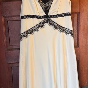 Elegant Cream Dress with Black Lace Detail